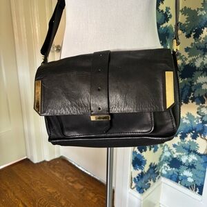 LINEA PELLE black Italian leather satchel purse flap front. Gold hardware  EUC